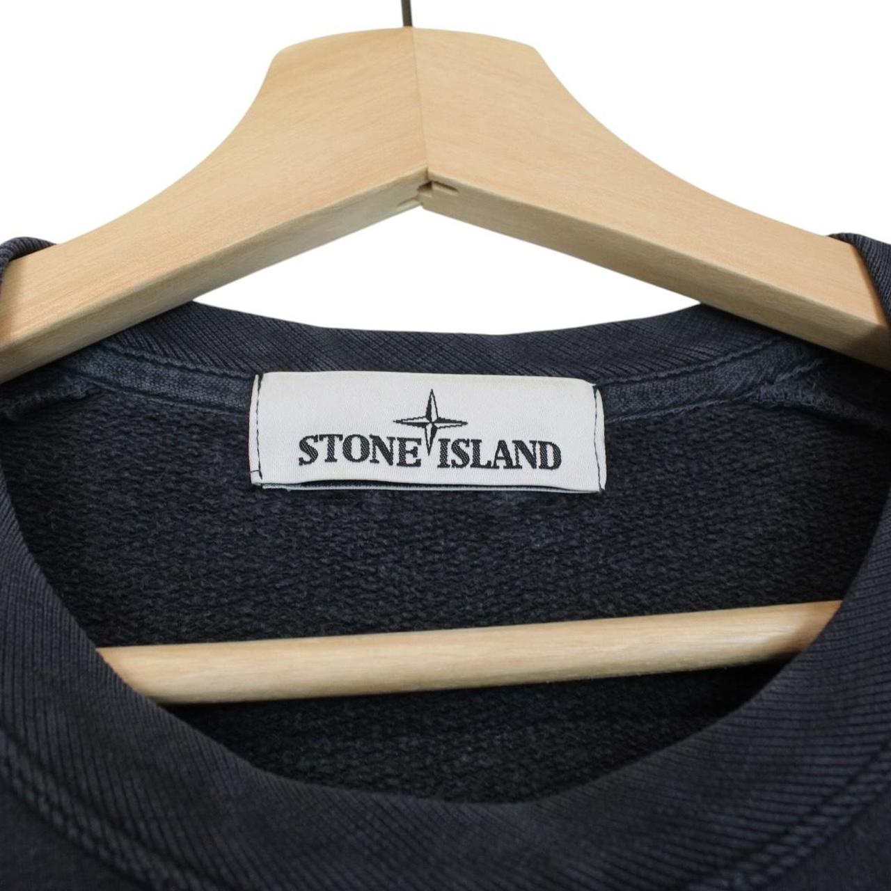 Stone Island navy blue cotton sweatshirt with logo patch and small sleeve repair.