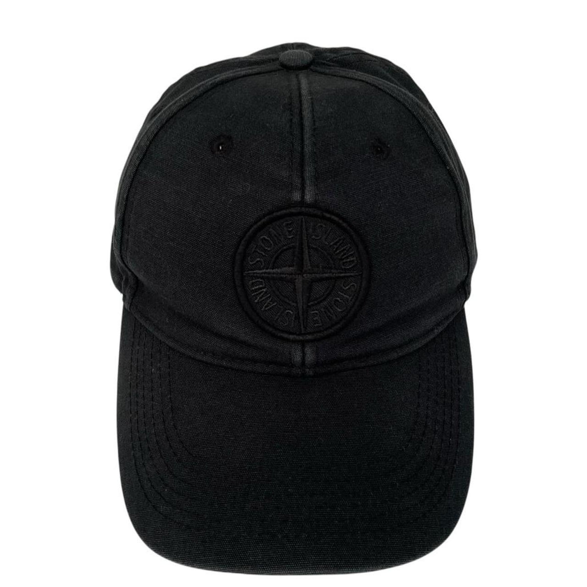 Stone Island black baseball cap with embroidered compass logo and cotton material.