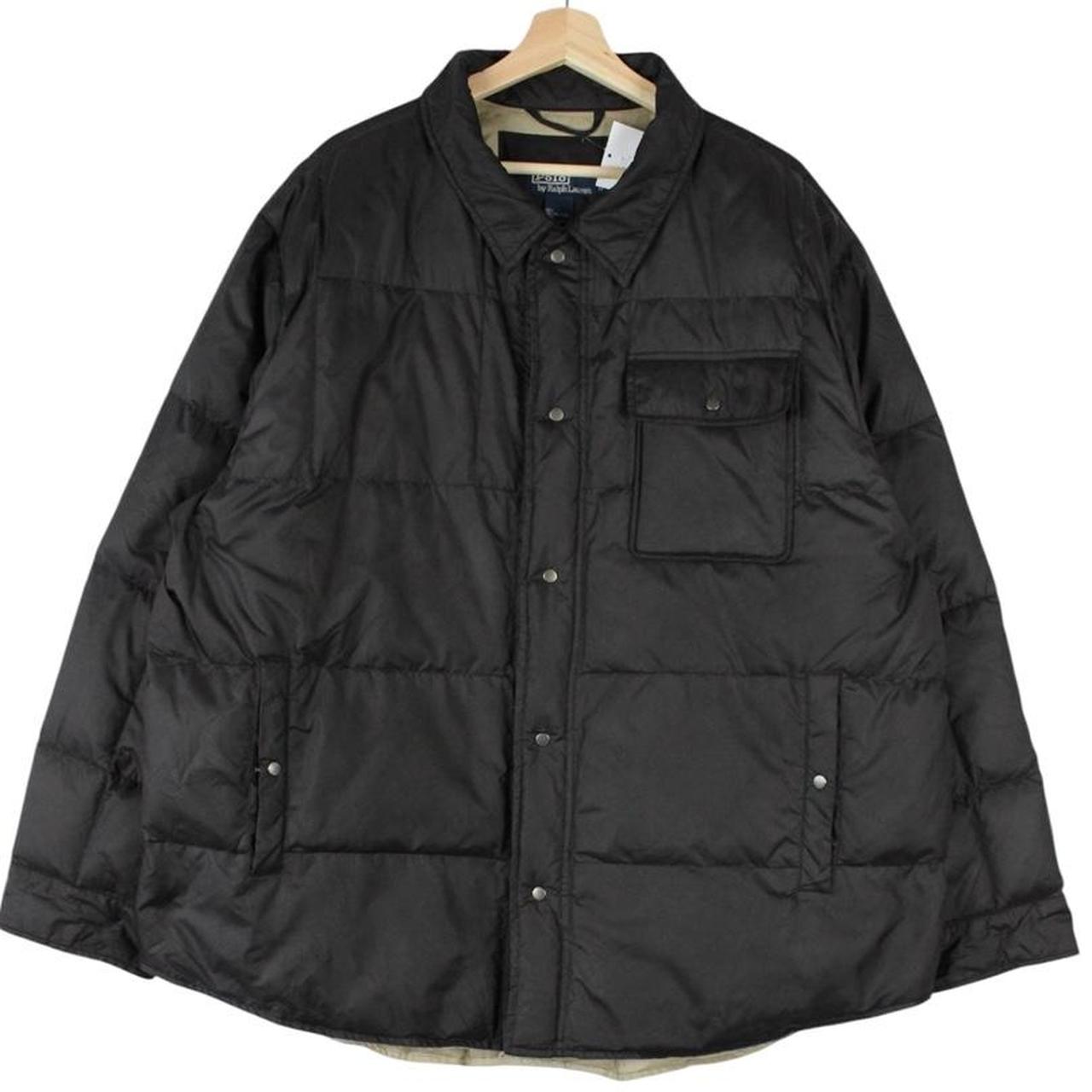 Polo Ralph Lauren black down jacket with logo patch and oversized fit.