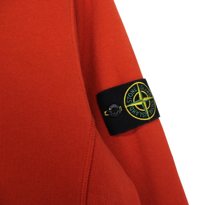 Stone Island red cotton sweatshirt with embroidered logo and ribbed cuffs.