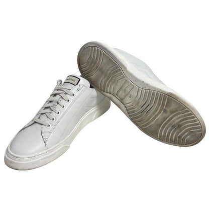 Valentino black and white trainers calfskin leather with logo detail and scuffed soles.