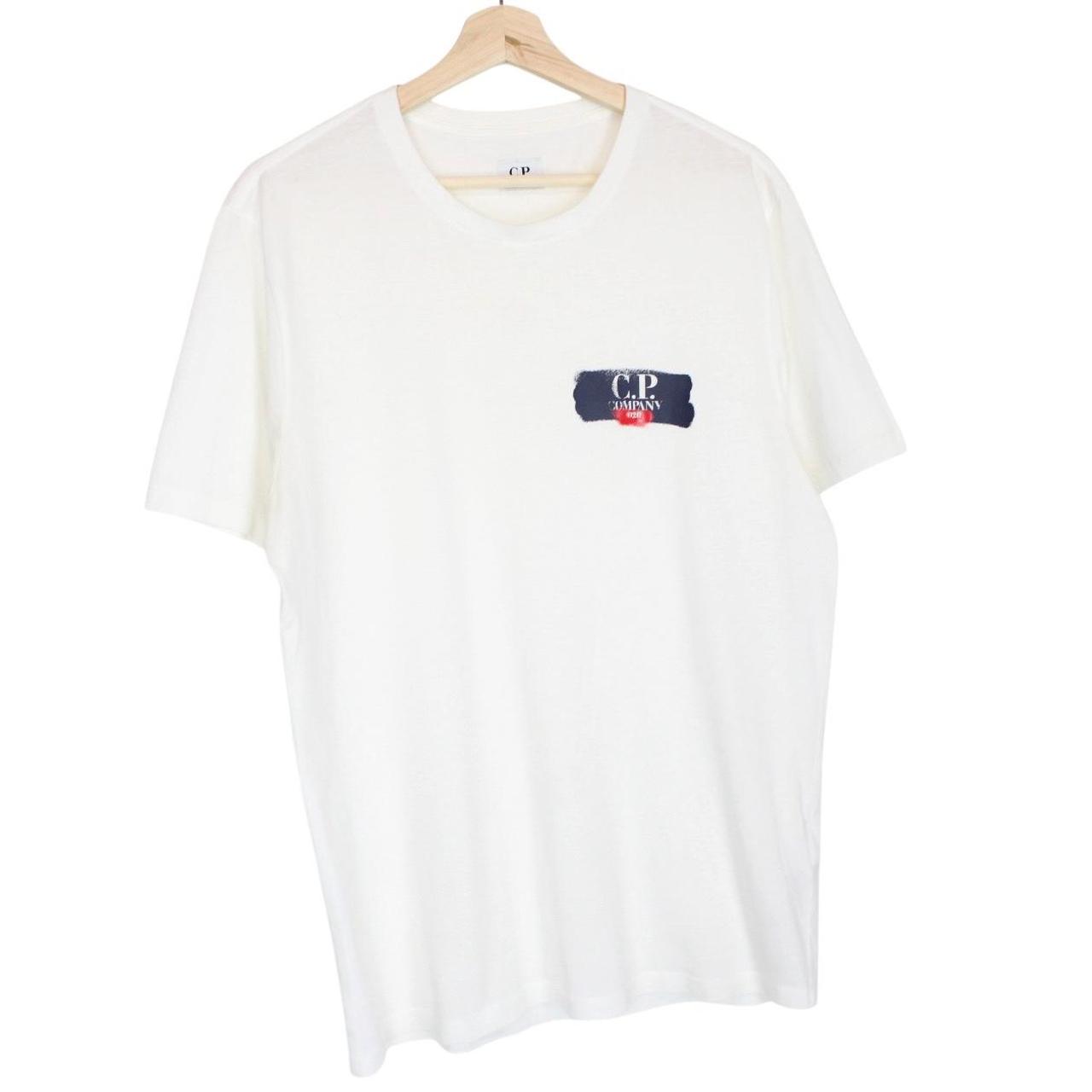 CP Company white short sleeve cotton t-shirt with chest logo print and pocket detail.