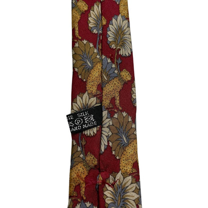Christian Dior multicoloured silk tie featuring leopard print pattern and logo detail.