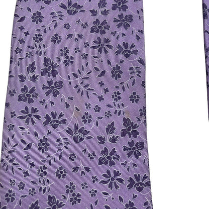 Ermenegildo Zegna purple silk tie with floral pattern and logo detail.