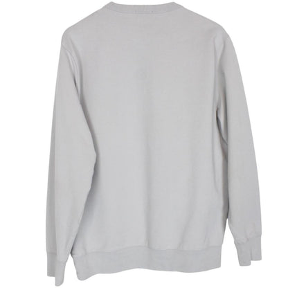 CP Company grey cotton sweatshirt with logo patch and ribbed cuffs.