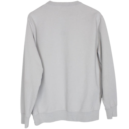 CP Company grey cotton sweatshirt with logo patch and ribbed cuffs.
