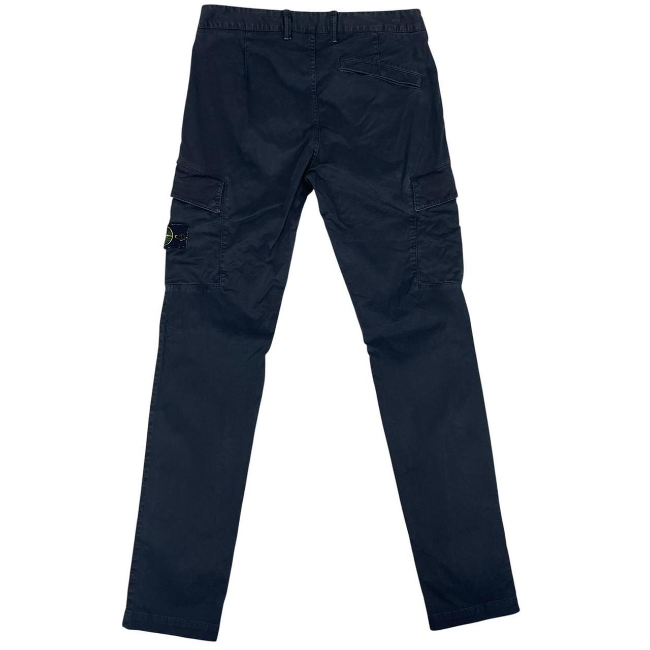 Stone Island navy blue skinny fit cargo trousers with logo patch and pockets.