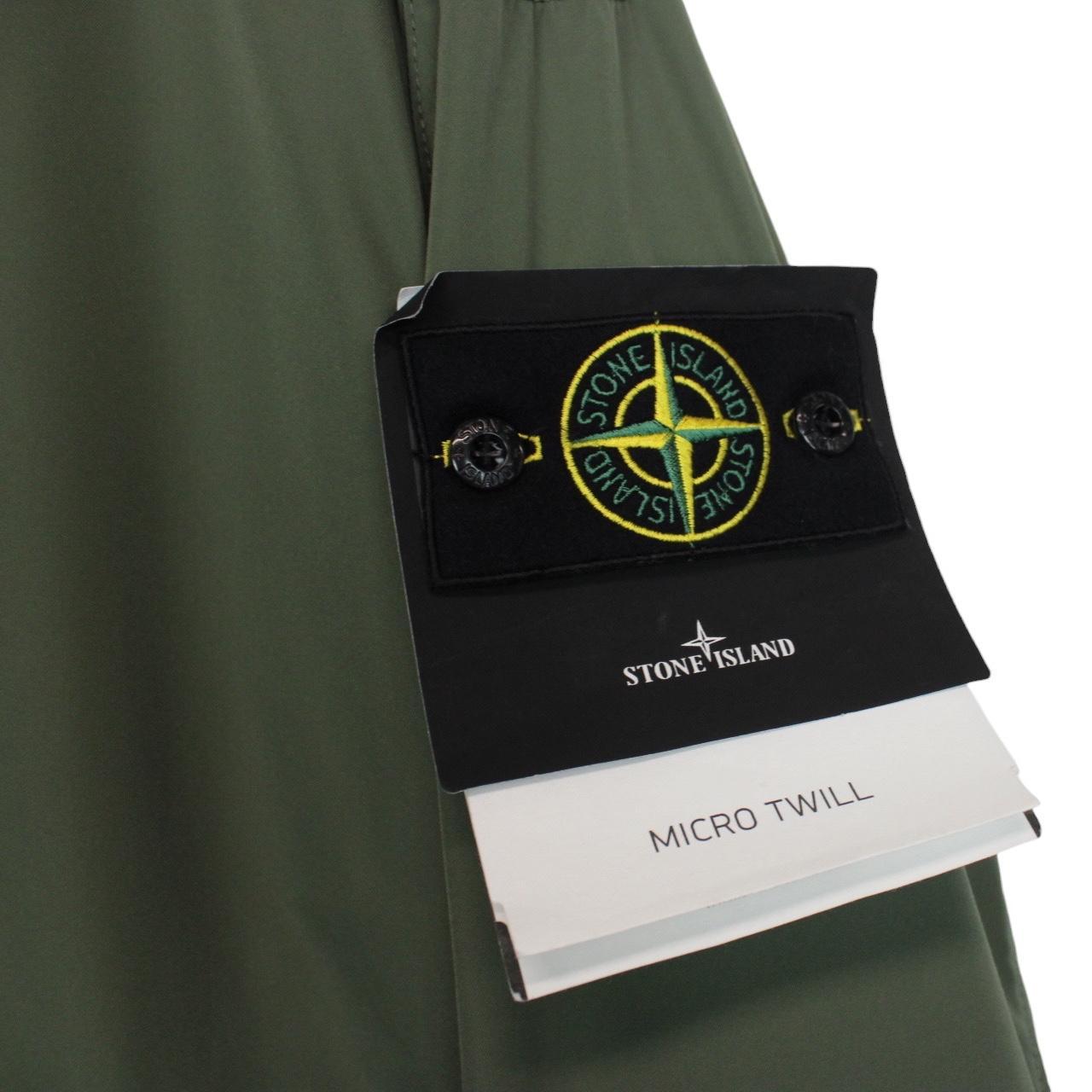 Stone Island green full zip jacket with packable hood and removable brand patch.