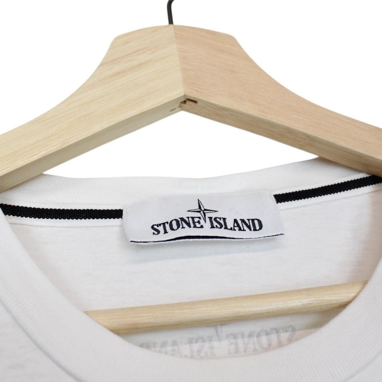 Stone Island white short sleeve cotton t-shirt with logo print and pocket detail.