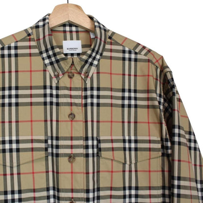 Burberry tan brown long sleeve shirt with Nova Check pattern and logo detail.