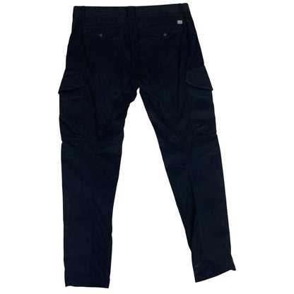 CP Company navy blue tapered fit cargo trousers with lens detail and pockets.