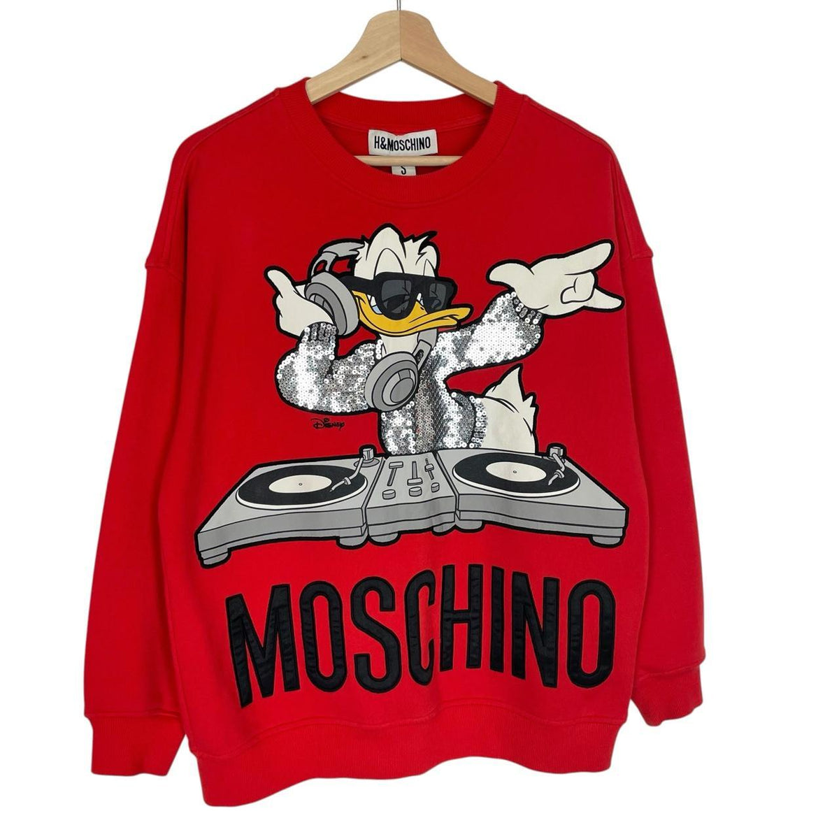Moschino red cotton sweatshirt featuring Disney graphic print and logo details.