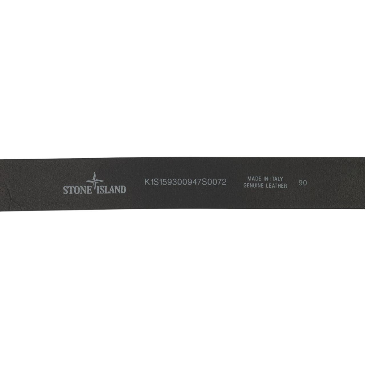 Stone Island black tumbled leather belt with debossed Compass logo and textured metal buckle.
