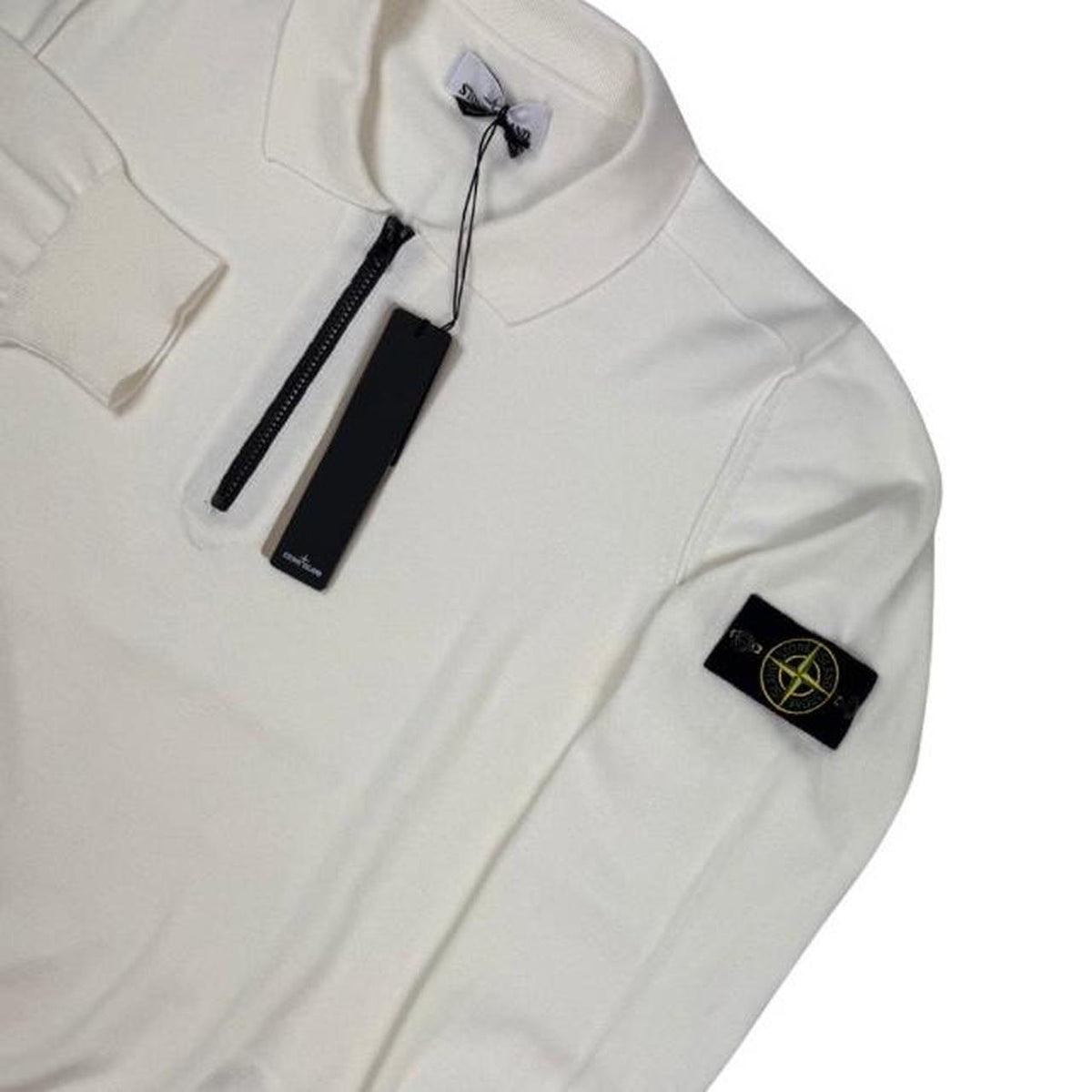 Stone Island white knit jumper with collared design and logo patch.