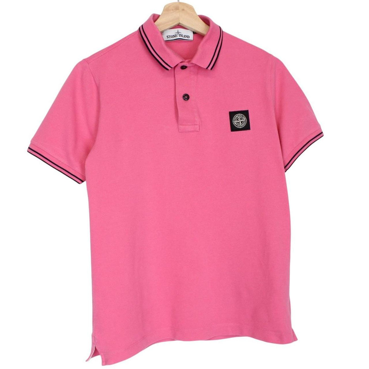 Stone Island pink short sleeve polo shirt with embroidered compass logo, cotton material.