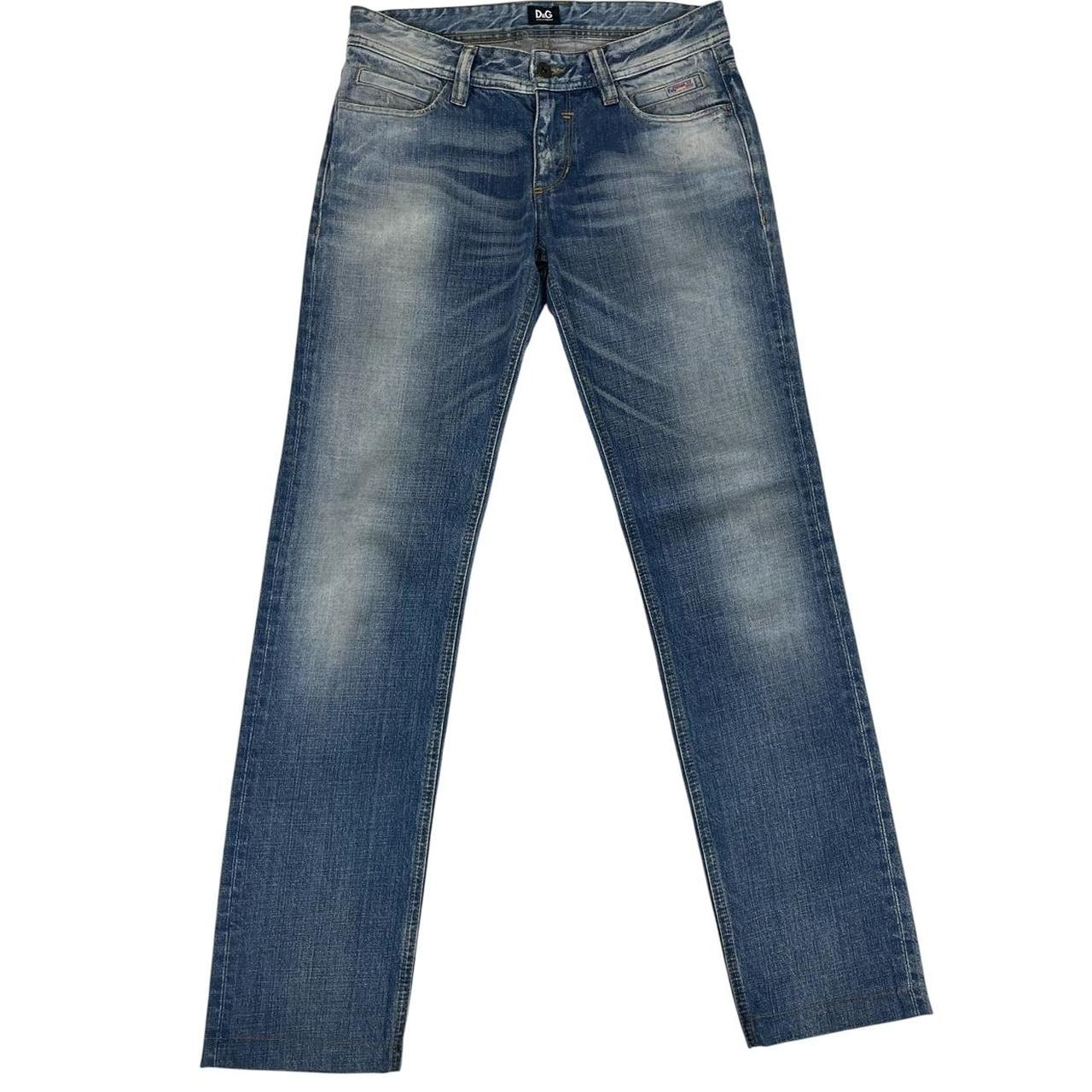 Dolce & Gabbana blue straight jeans mid wash with logo patch and slim fit design.
