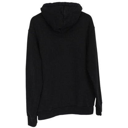 Palm Angels black and orange hoodie with Beverly Hills spray design and cotton material.