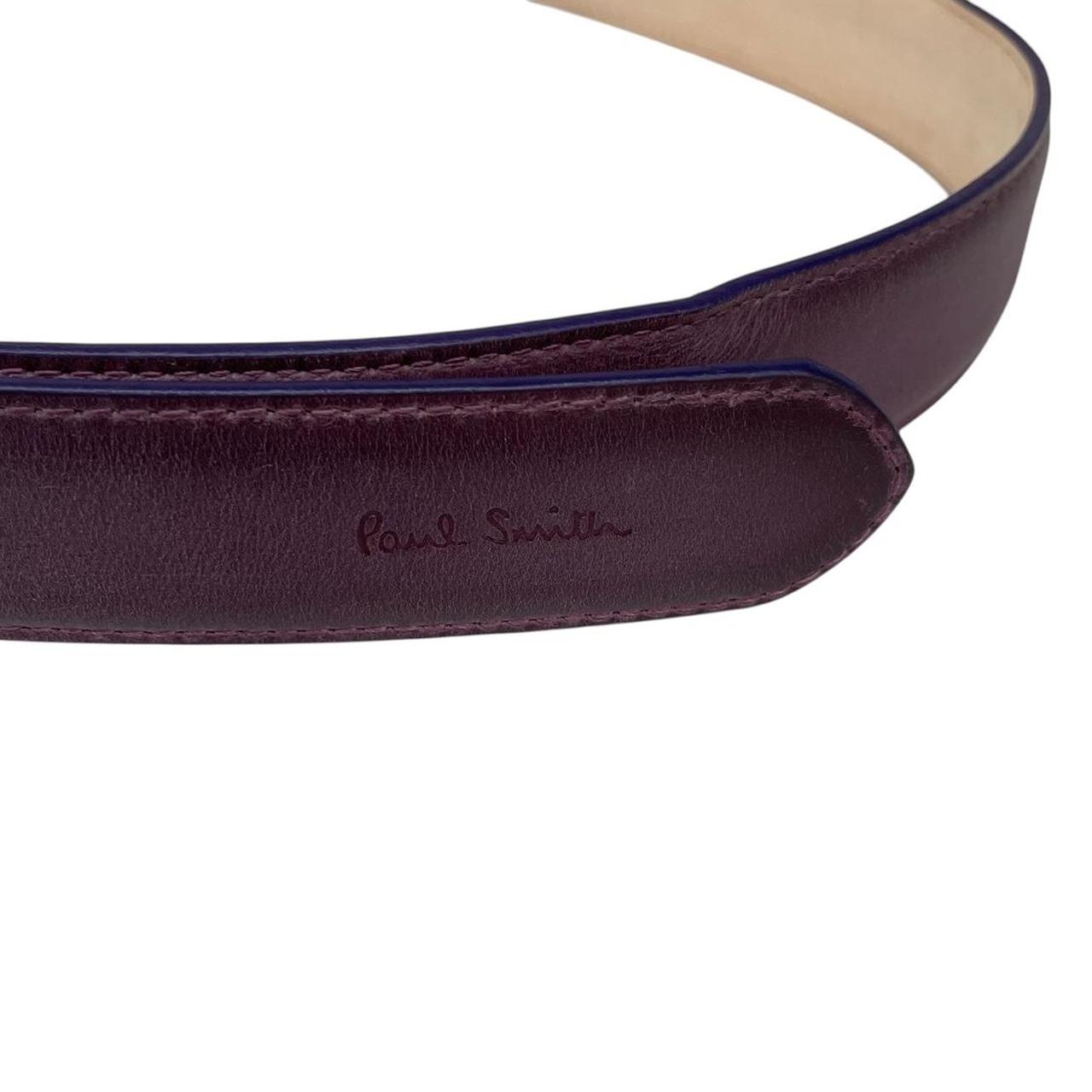 Paul Smith purple leather belt handcrafted in Spain with subtle storage marks.