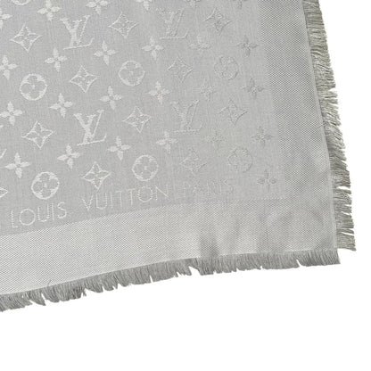 Louis Vuitton grey shawl scarf with LV monogram pattern in silk and wool blend.