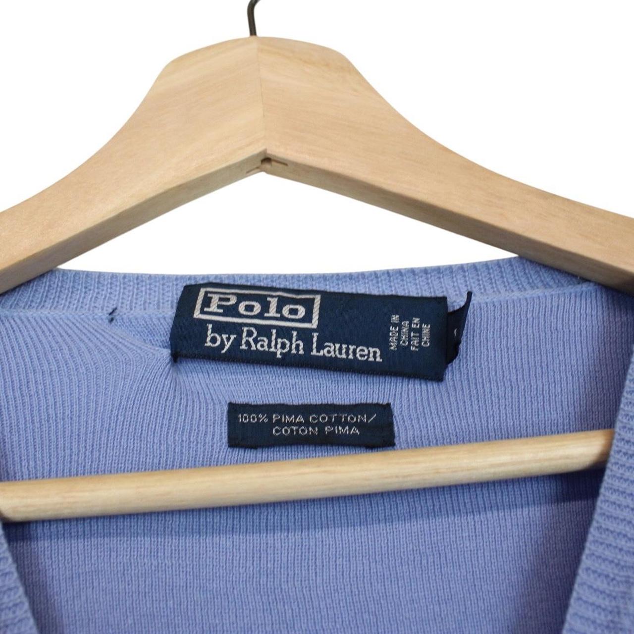 Polo Ralph Lauren blue knit v-neck jumper, soft pima cotton, faint marks visible.