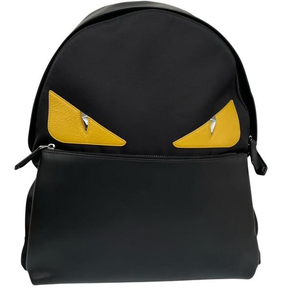 Fendi black and yellow nylon/leather backpack with monster bug eyes design.