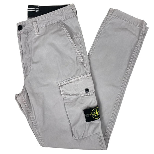 Stone Island grey cargo trousers with logo patch and slim fit design.