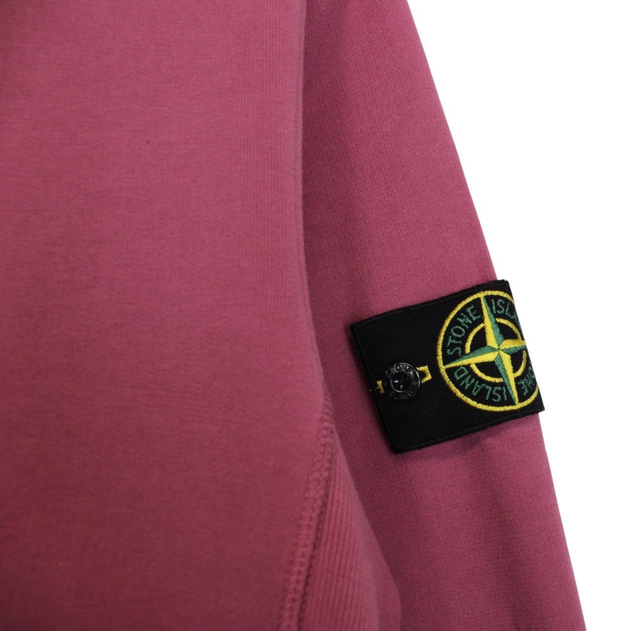 Stone Island mauve cotton sweatshirt with embroidered compass logo and ribbed cuffs.