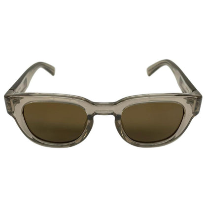 Saint Laurent transparent sunglasses with logo print, modern design, brand new condition.