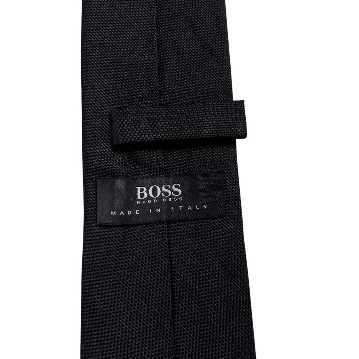 Hugo Boss black silk tie with subtle sheen and classic design.