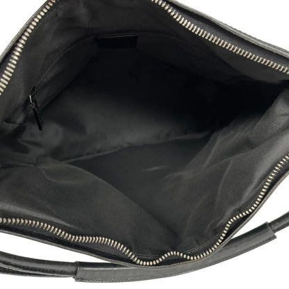 Gucci black hobo shoulder bag with monogram canvas and leather detailing.