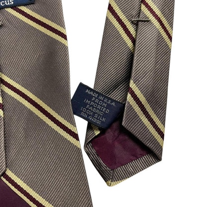 Polo Ralph Lauren grey silk tie with Neiman Marcus label and smooth texture.