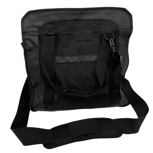 Stone Island black nylon tote bag with logo patch and crossbody strap.