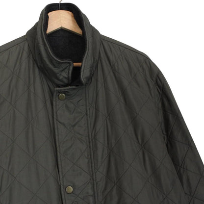 Burberry khaki green quilted field jacket with Nova Check pattern and logo details.