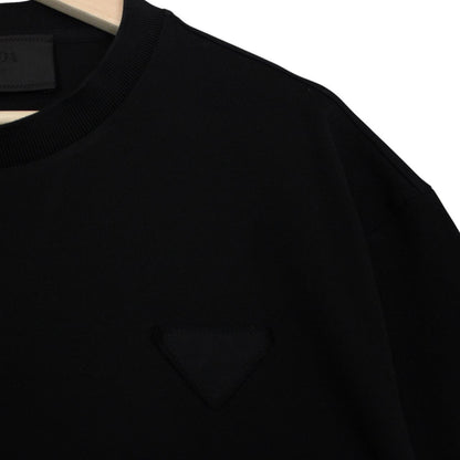 Prada black and white cotton short sleeve t-shirt with logo pocket detail.