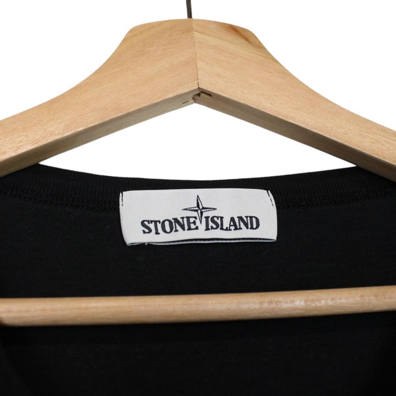 Stone Island black short sleeve t-shirt with desert camo pattern and compass logo.