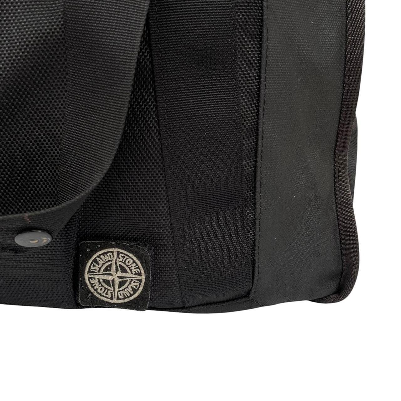 Stone Island black nylon tote bag with logo patch and crossbody strap.