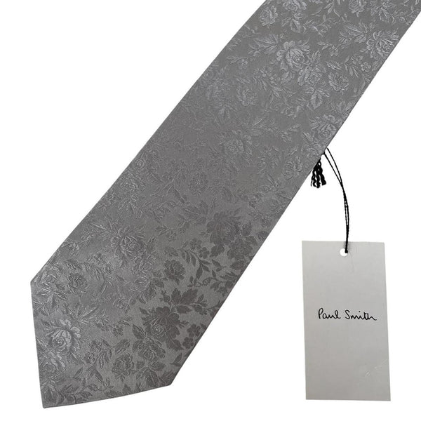 Paul Smith silver silk tie with floral print and brand logo detail.