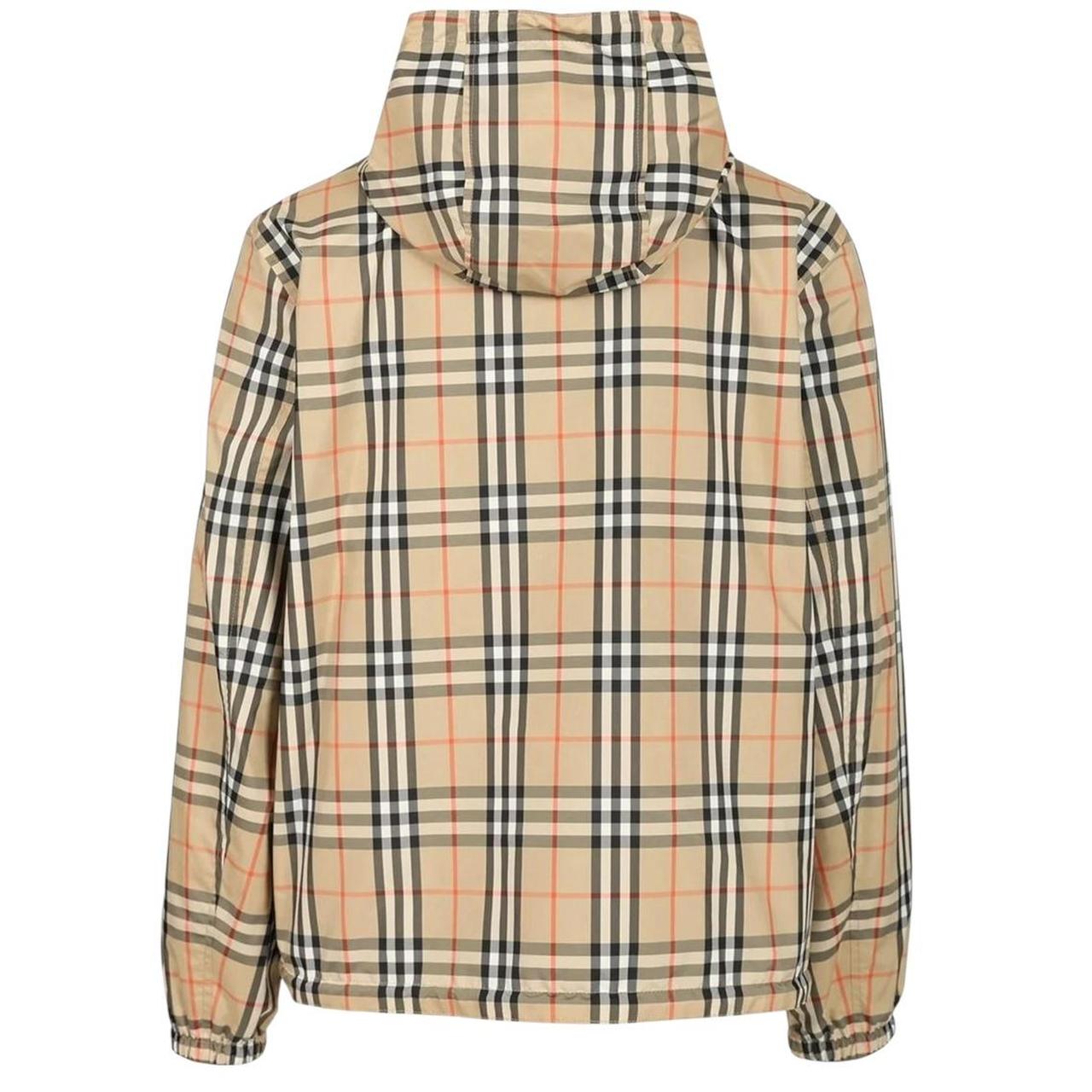 Burberry reversible windbreaker jacket in sand beige and black Nova Check pattern.