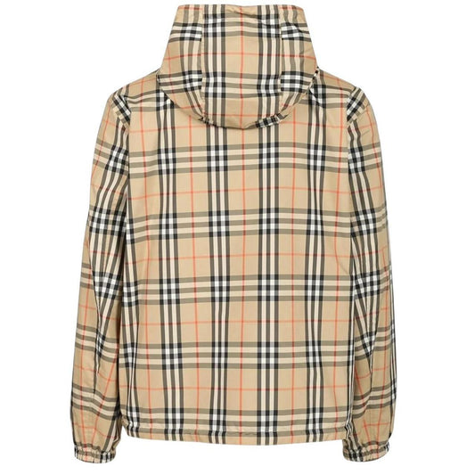 Burberry reversible windbreaker jacket in sand beige and black Nova Check pattern.