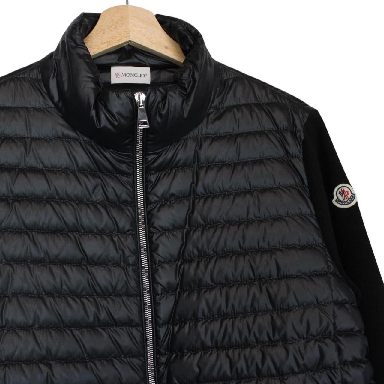 Moncler black cardigan jacket with full zip, down tricot material, and logo detail.