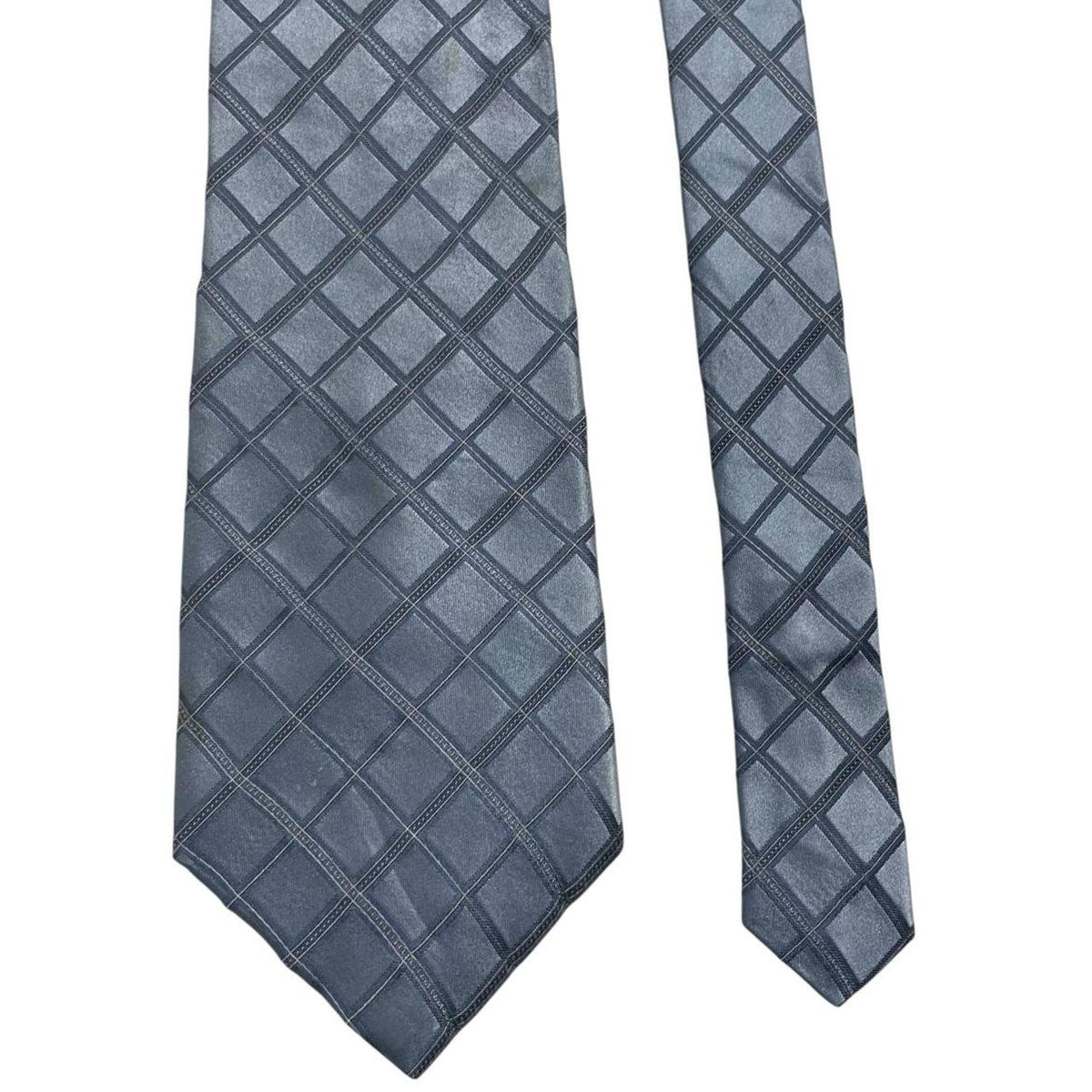 DKNY light blue silk tie with subtle sheen and vintage design.