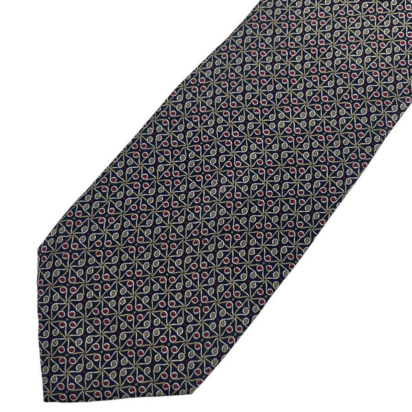 Gucci navy blue silk tie with vintage pattern and logo detail.
