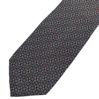 Gucci navy blue silk tie with vintage pattern and logo detail.