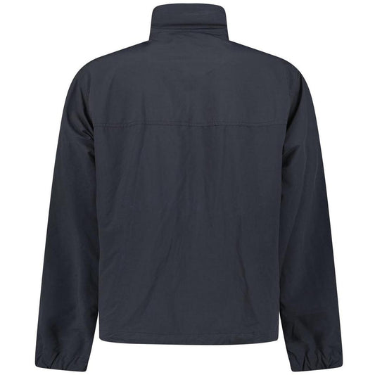 Moncler black windbreaker jacket with full zip, logo patch on sleeve, lightweight material.