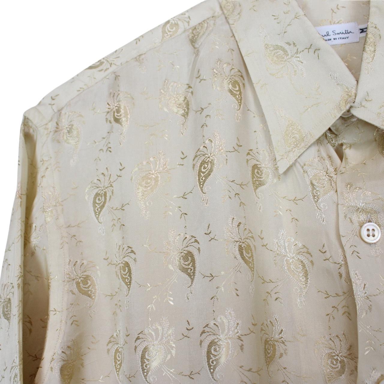 Paul Smith beige long sleeve silk shirt with subtle logo detail and smooth texture.