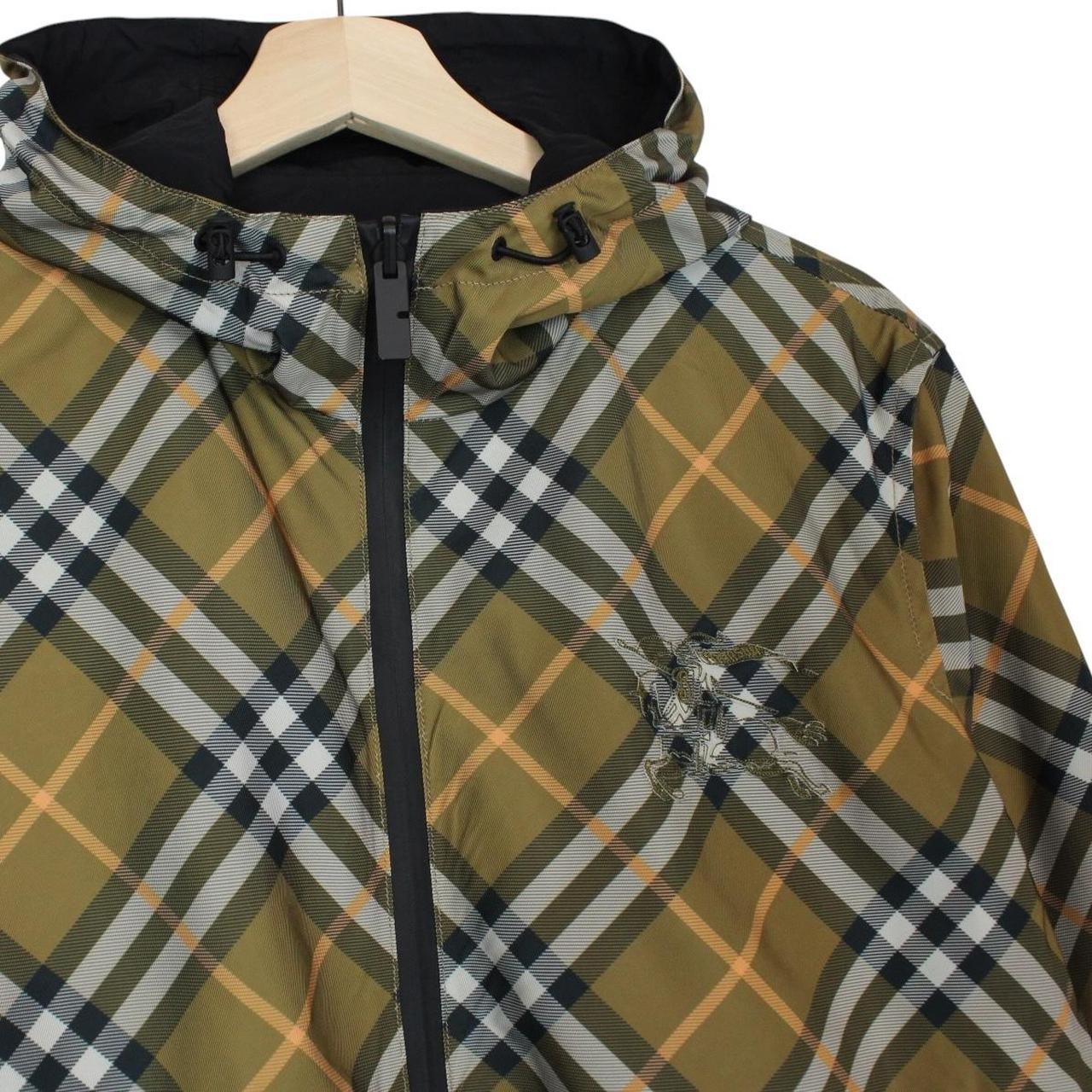Burberry reversible nylon jacket in brown and black Nova Check pattern with logo.