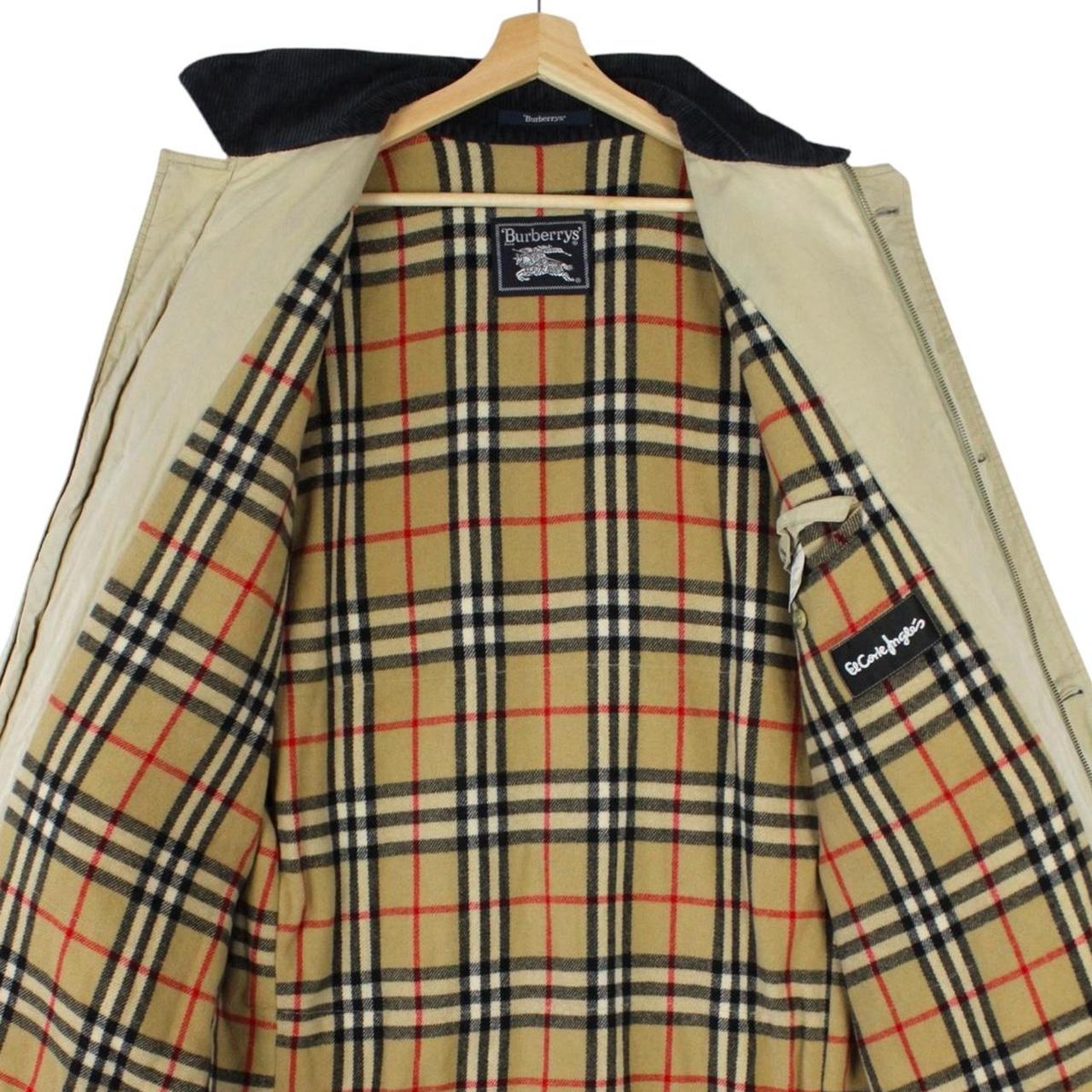 Burberry beige wool coat with Nova Check lining and logo detailing.