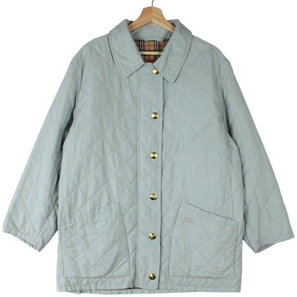 Burberry light blue diamond quilted jacket with Nova Check pattern and logo detail.