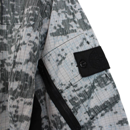 Stone Island bomber jacket grey marl with embroidered compass logo and unique pattern.