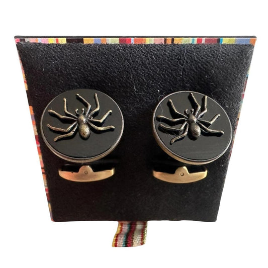 Paul Smith gunmetal cufflinks 2D spider design with intricate detailing and brand logo.